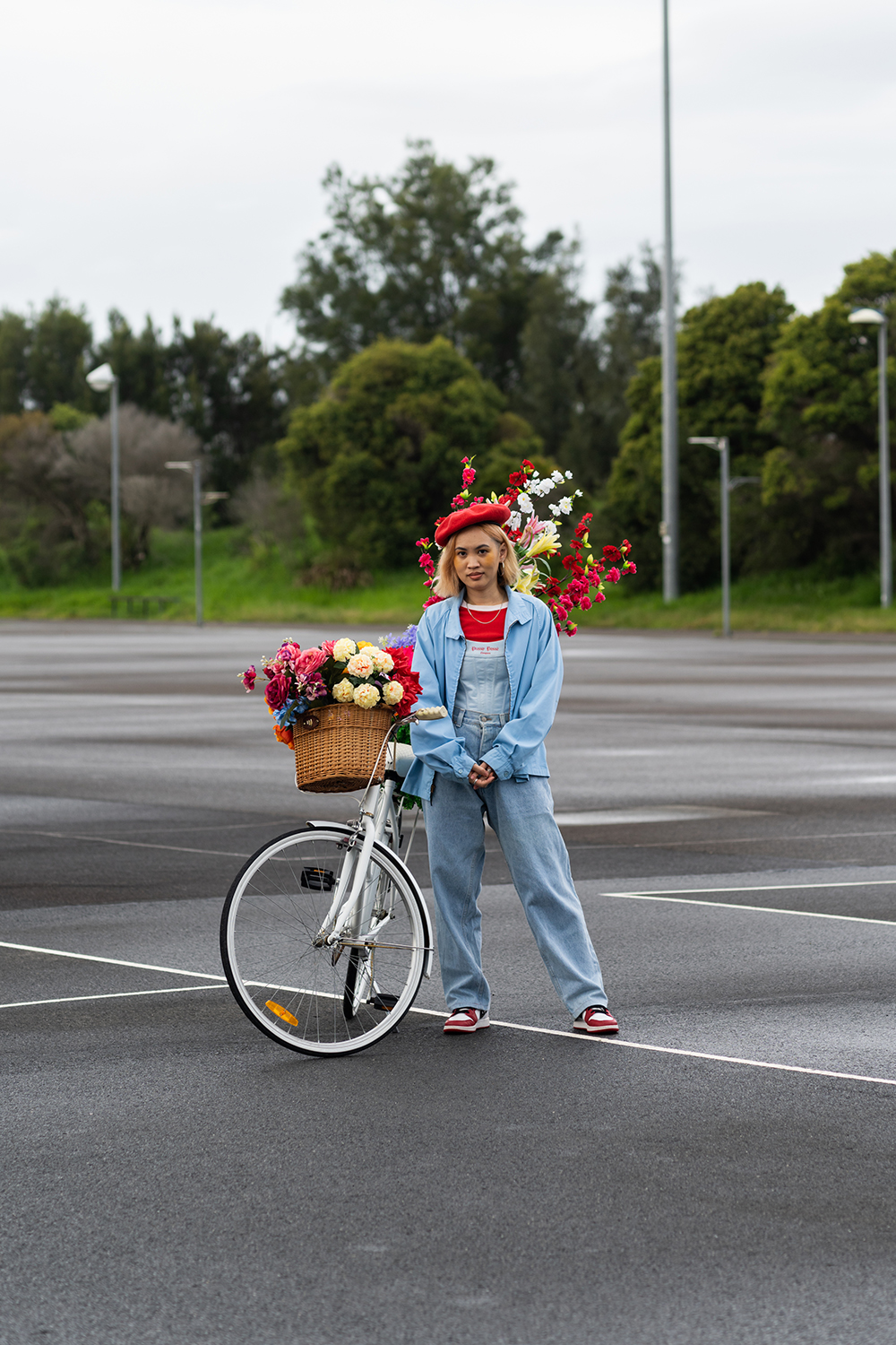 Jade Kenji with bicycle prop