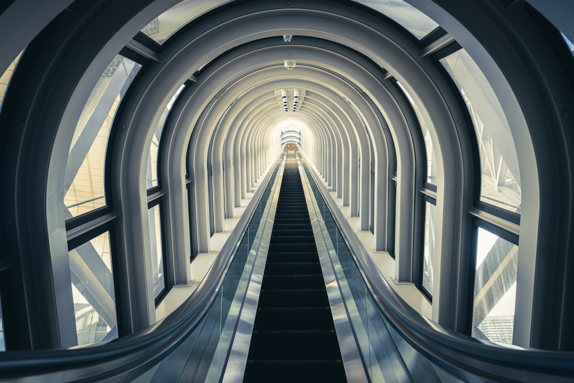 Tunnel of an upriding escalator to the observatory deck in the Sakishima Building