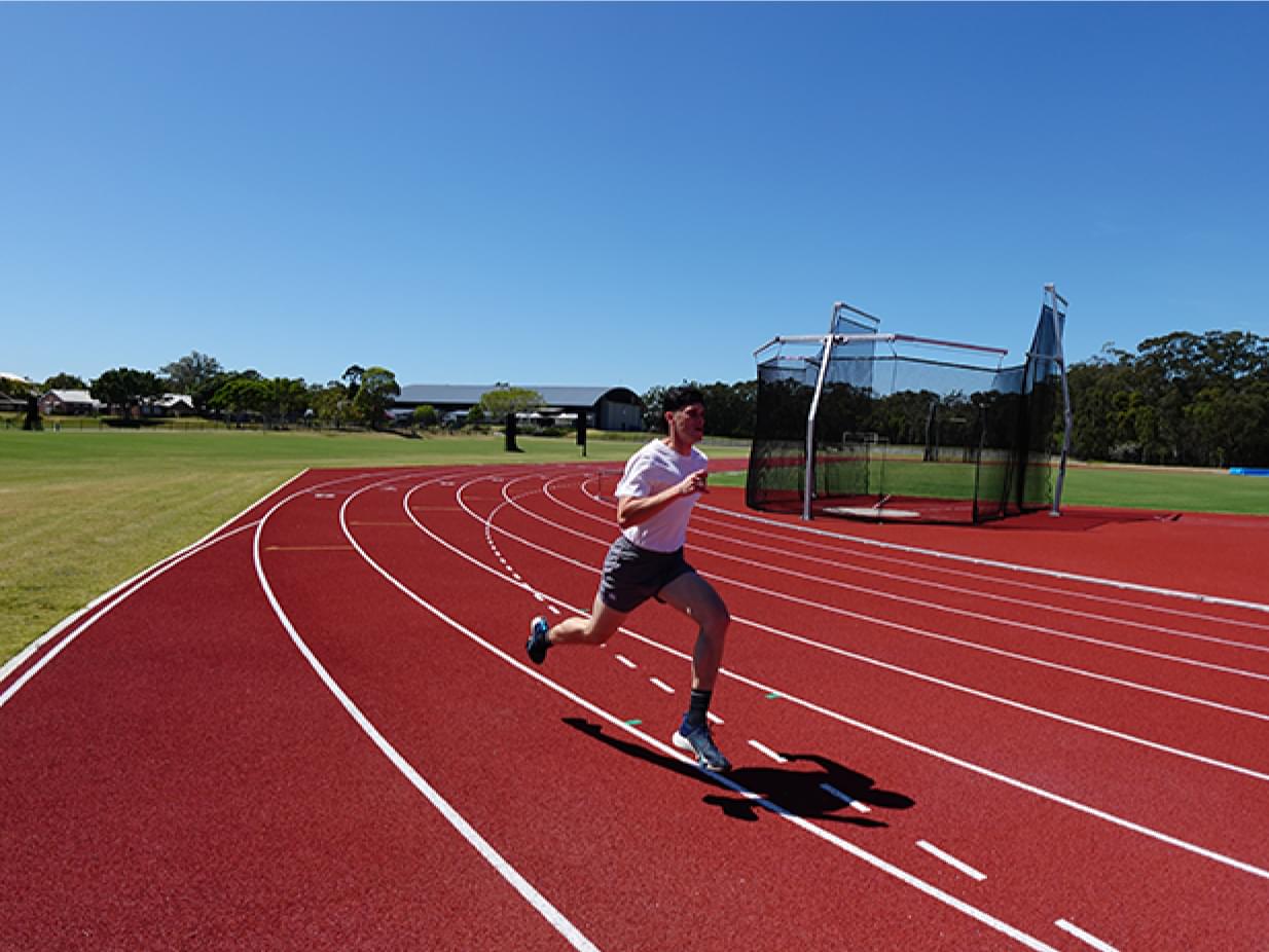 Image of Mackenzie on a running track - image shot by the Sony ZV-1F camera